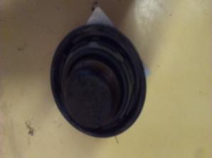 CAP-OIL FILLER